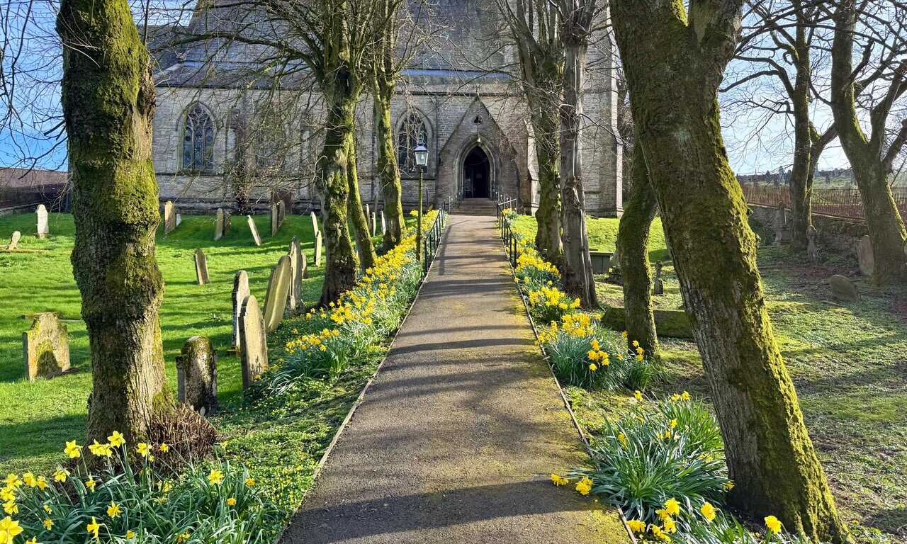 Exterior view of St Margaret’s Church in Hawes, where the millennium window connected with the trail can be seen.