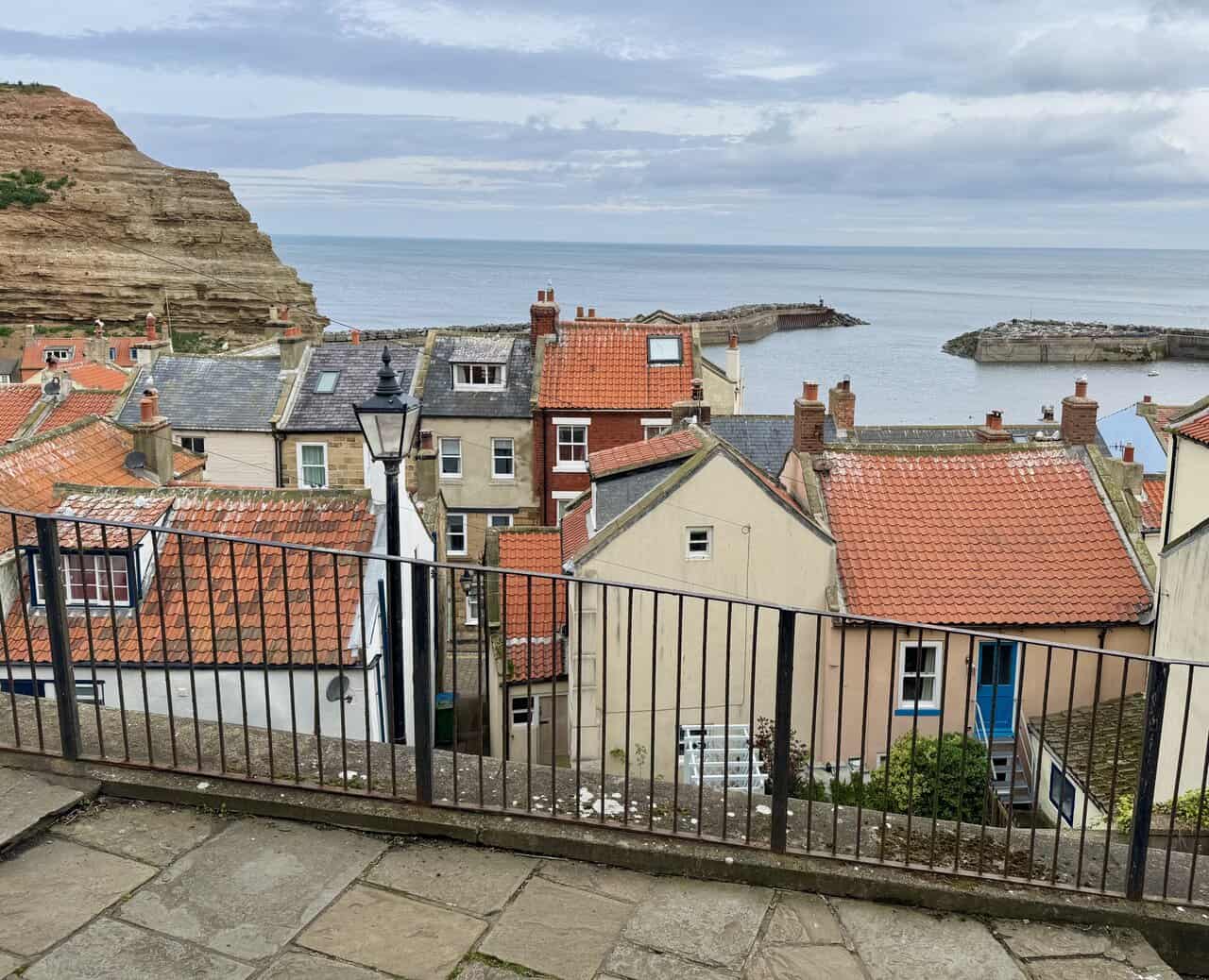 Looking down on Staithes from the Runswick Bay circular walk reveals the harbour and surrounding cliffs.