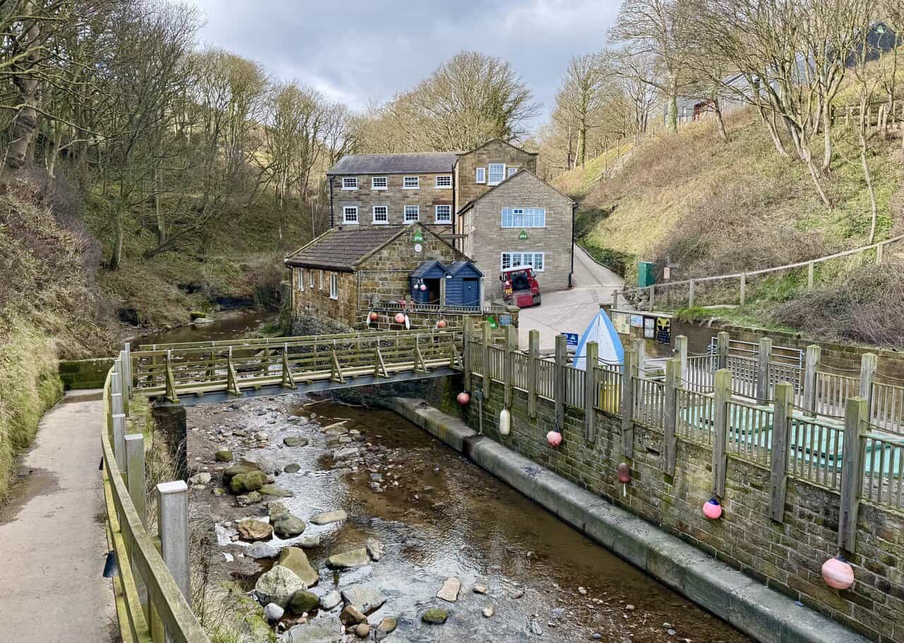 At Boggle Hole, the walk drops into a steep ravine steeped in local folklore; the name comes from a boggle, a mischievous spirit said to have been banished from Robin Hood's Bay to a cave in the cliffs.