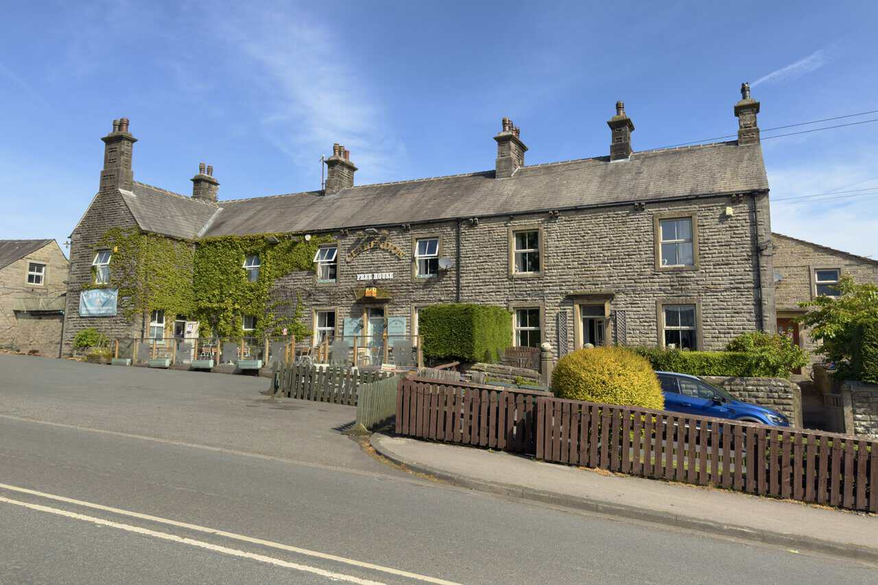 The Clarendon Hotel in Hebden, a stone-built 18th-century country inn with an ivy-clad frontage on the B6265.