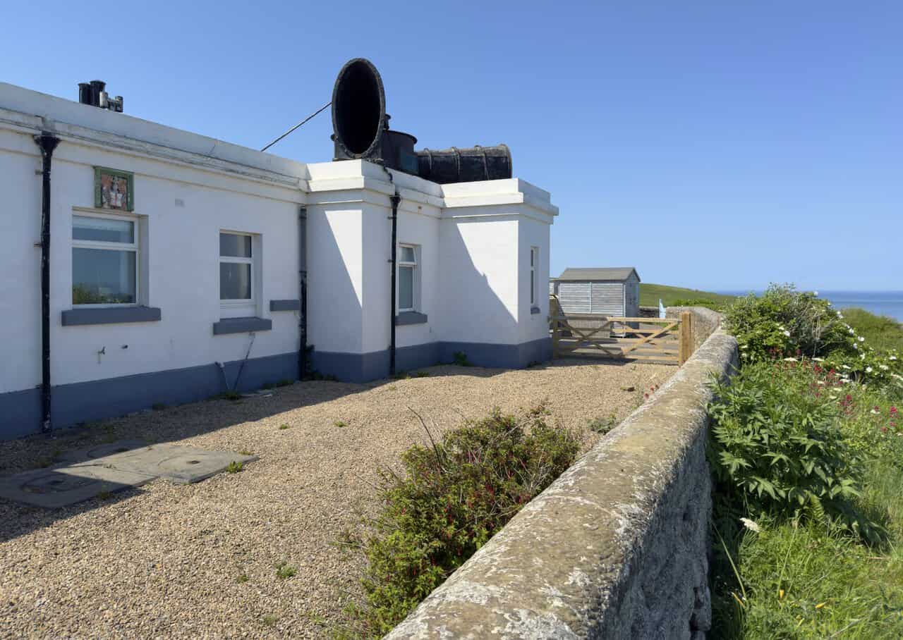 The roof-mounted trumpet of Whitby Fog Signal points out to sea, a reminder of its former warning role in thick weather.