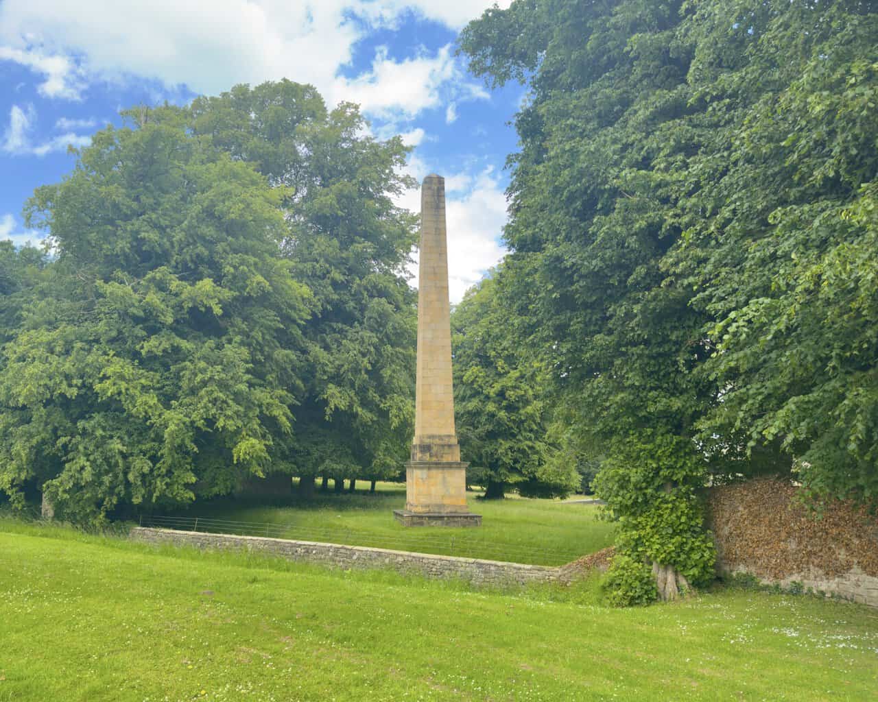 The Studley Royal obelisk on a Ripon walk, a tall stone memorial to John Aislabie near the deer park gates.