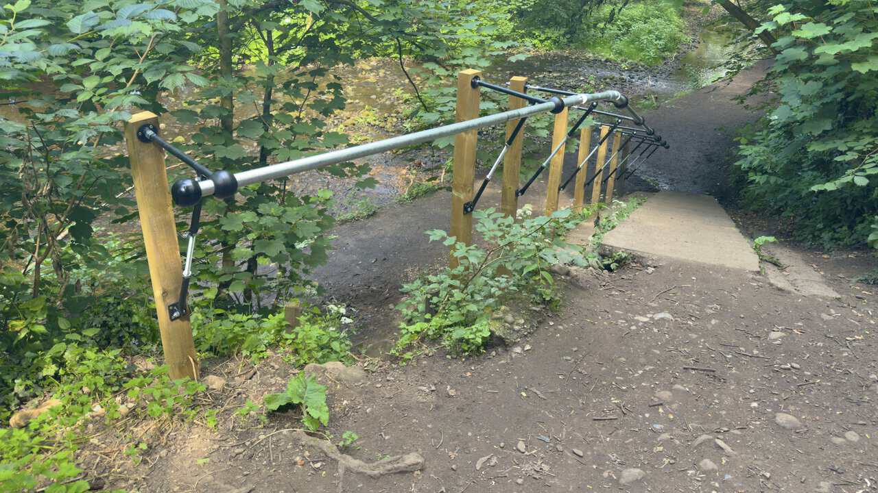 The Fairy Steps in Hell Wath Nature Reserve, broad shallow steps descending towards the River Skell.
