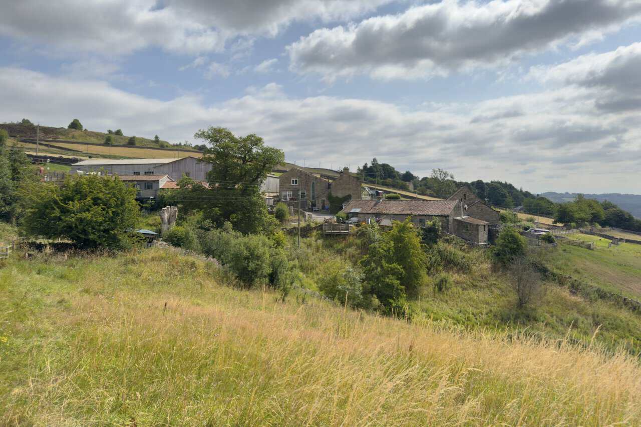 Stone houses and farm buildings in the small hillside settlement of Knott.