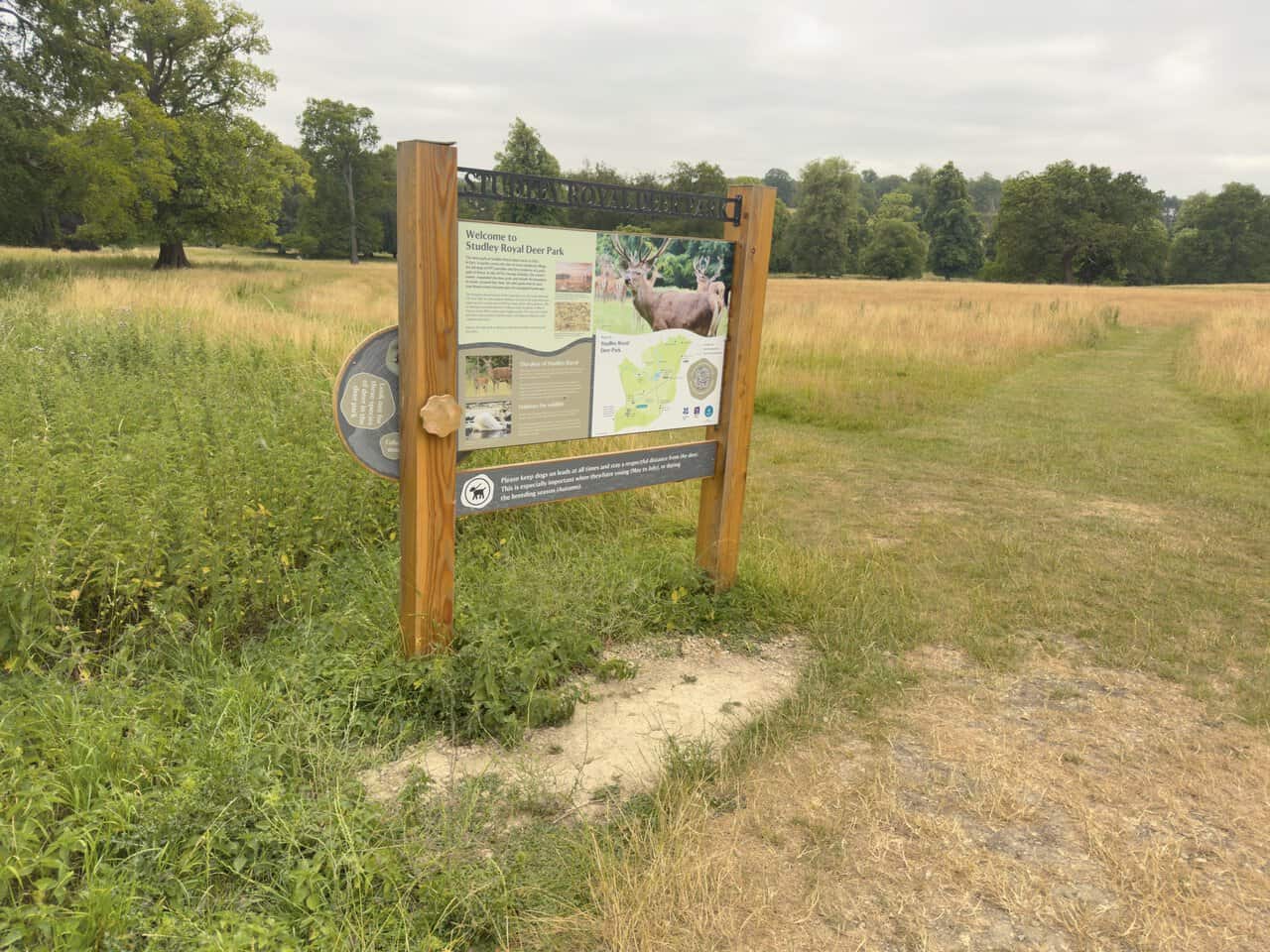 A large interpretation board in Studley Royal Deer Park, showing a map of the area and its grazing herds.