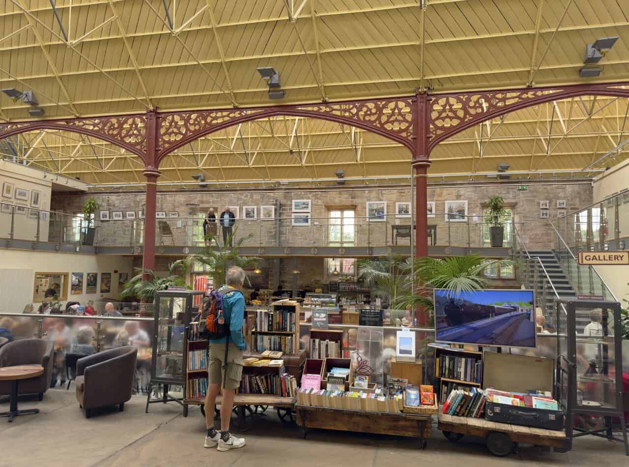 Interior of The Station on the Richmond walk, showing the glazed roof, ornate ironwork and restored railway architecture.