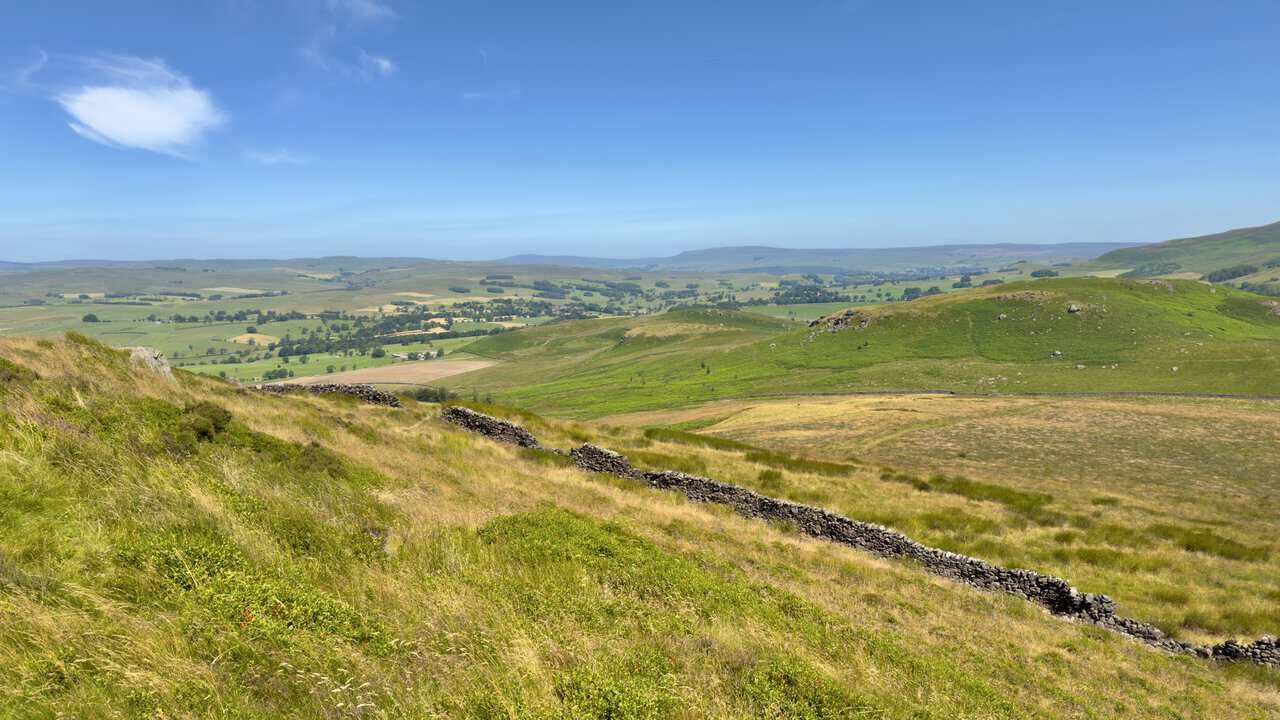 View north from Sharp Haw into the Yorkshire Dales, with Buckden Pike left and Great Whernside right.