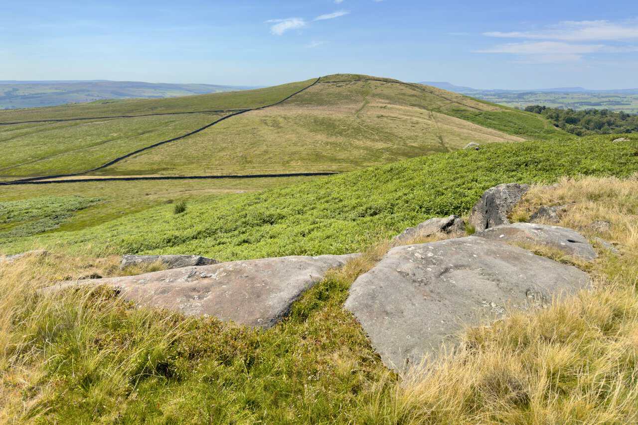 Sharp Haw seen from Rough Haw across the shallow gap between the two summits of Flasby Fell.