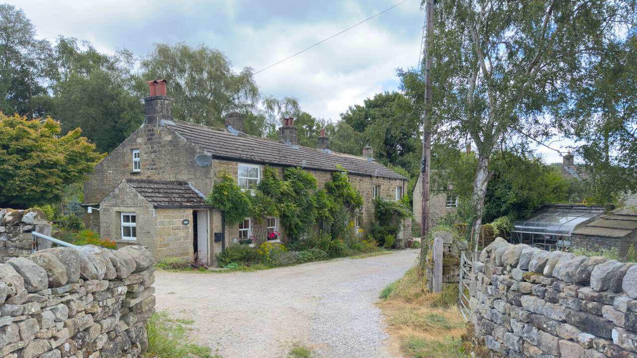 A row of stone cottages on the Yorke's Folly walk, beside the track leading down towards Glasshouses.