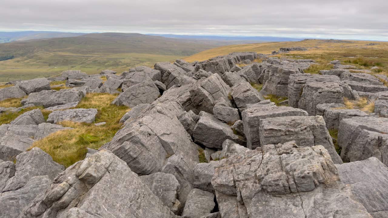 Fractured gritstone slabs along the summit ridge on the Great Whernside circular walk.