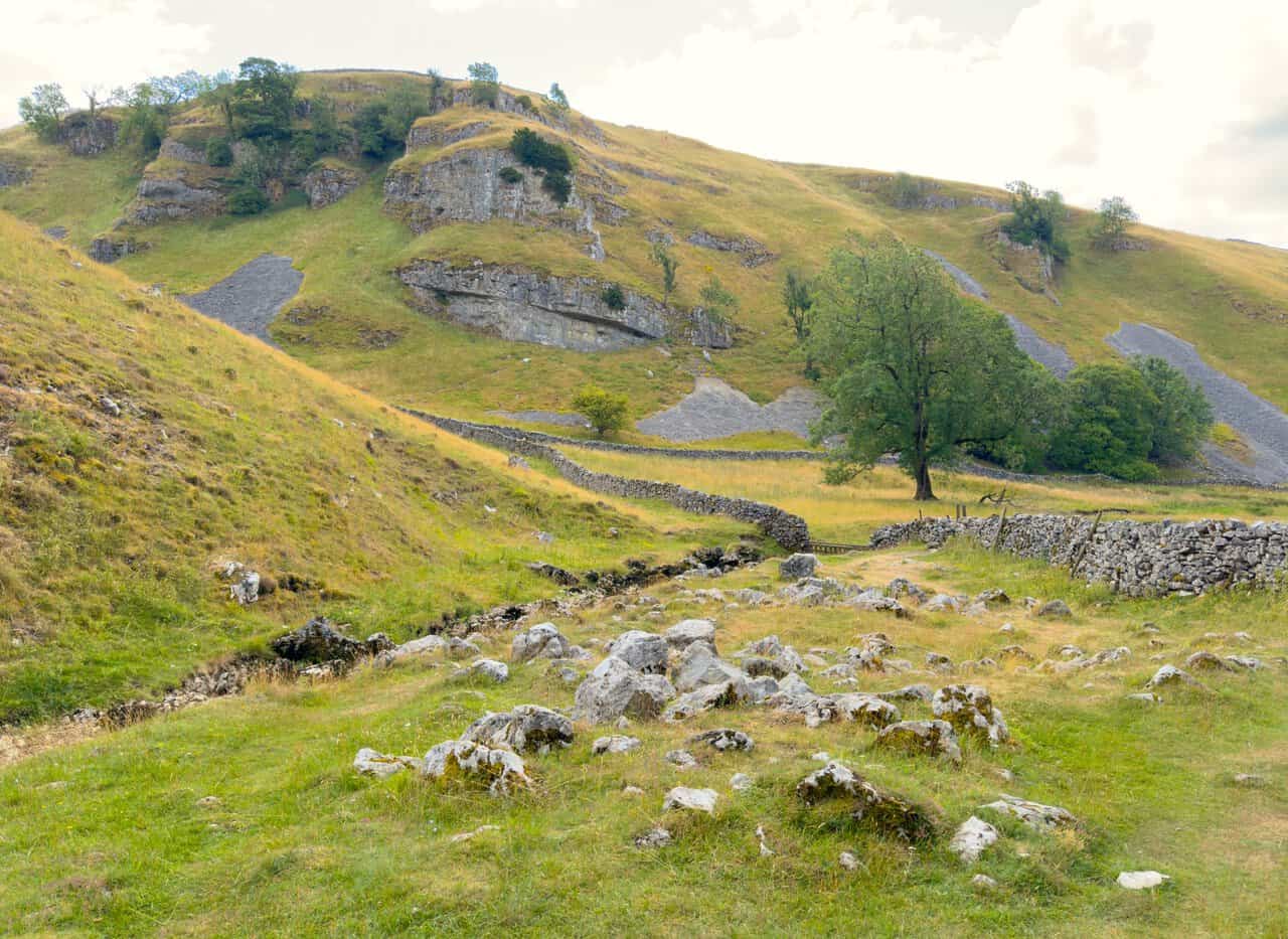 Old Man's Scar rising across the valley, its pale crags broken by long runs of grey scree.