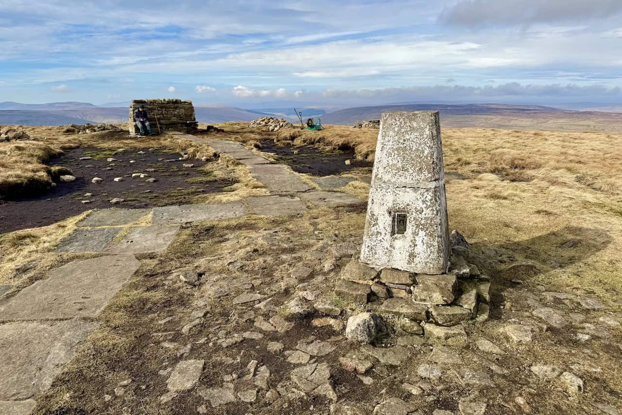 The triangulation pillar and stone shelter on Buckden Pike, the second summit of the Wharfedale 3 Peaks.