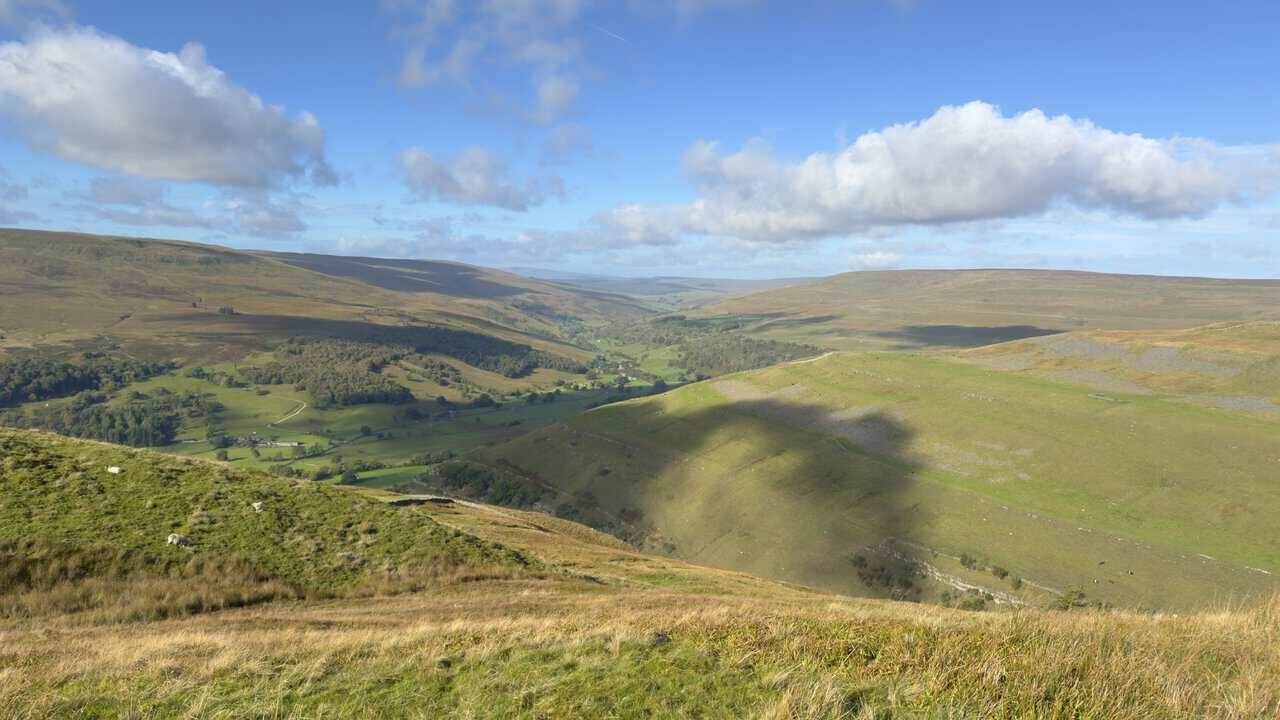 The steep-sided valley of Buckden Beck, with Upper Wharfedale stretching into the distance.